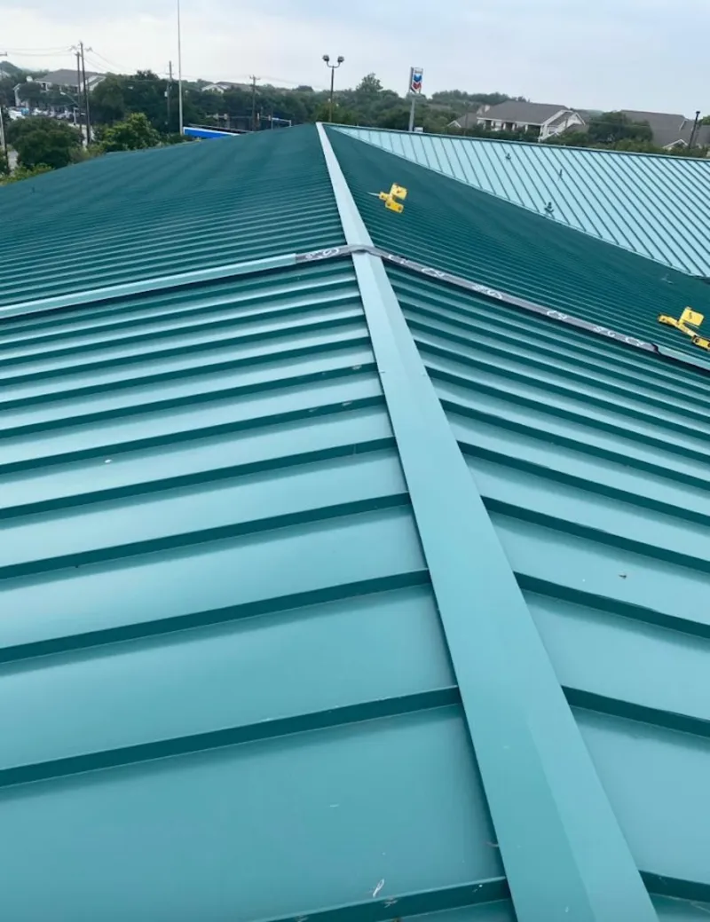 Green commercial metal roof ridge and valley for Metal Roof Repair in Doolittle